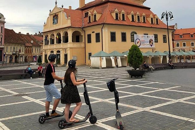 Brasov Old Town Guided Tour With Electric Scooters - Guide quality and the small-group advantage