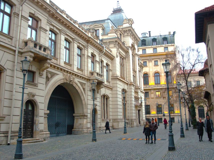 Bucharest by car - full day 'stop and visit' experience - Revolution Square, the Athenaeum, and royal Bucharest
