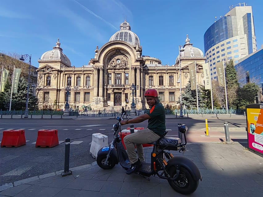Bucharest electric city tour by Smart Balance #green - The House of the Free Press and the Triumphal Arch