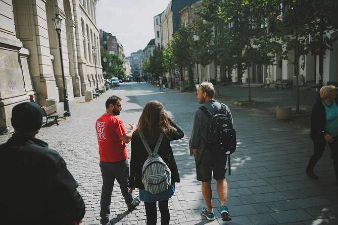 Discover Bucharest: Private Highlights and Traditional Food Tour - Communist Bucharest and the Palace of the Parliament