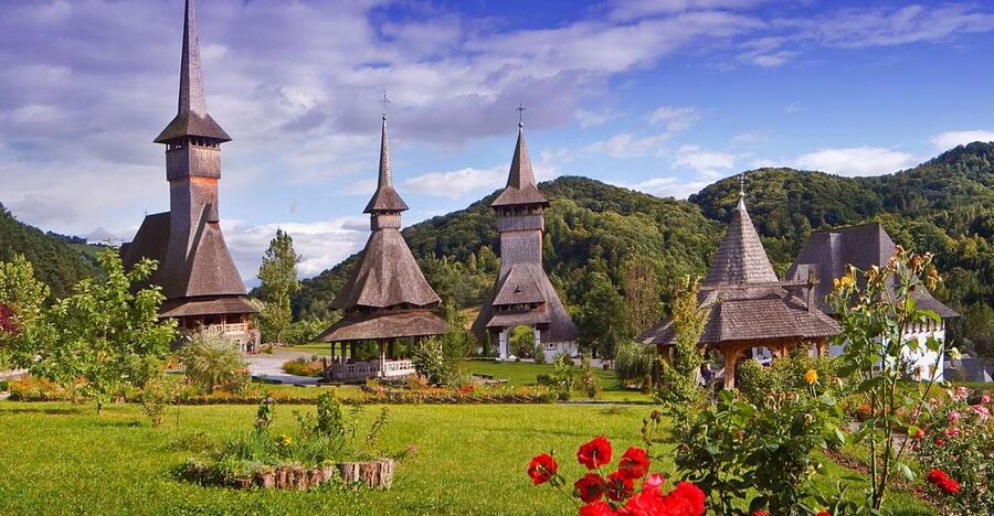 From Cluj-Napoca: Two Day Tour to Maramures - Breb begins with a carved gate and a generous meal