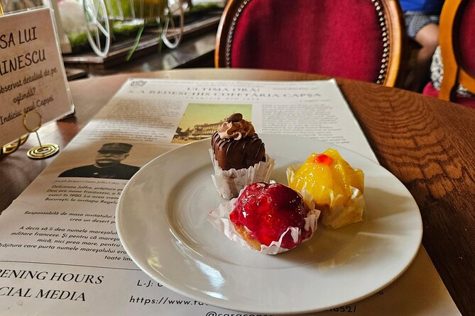 Sweet Delights History and Desserts Walking Tour in Bucharest - Starting with an eclair at the Romanian Athenaeum