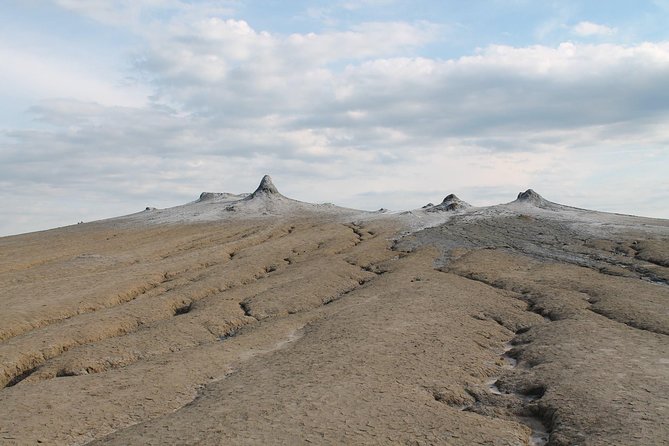 The Salt Mines, The Winery, The Muddy Volcanoes! The Fixers Private Tour - Entering the Unirea Salt Mine at 208 meters