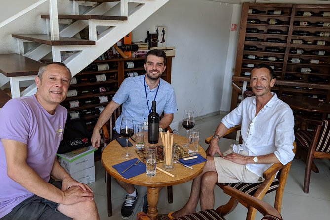Traditions in Bucharest: Village Museum and Wine Tasting Tour - Handmade Romanian crafts in a short shopping stop