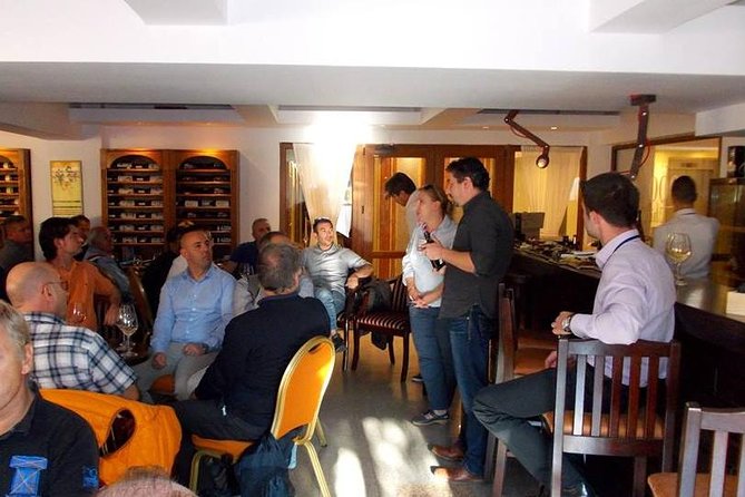 Traditions in Bucharest: Village Museum and Wine Tasting Tour - Romanian wine and local food finish the afternoon